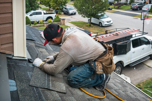 Professional Roof Replacement technician working in Brighton, MA